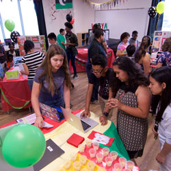 Students share their projects during World's Fair. 