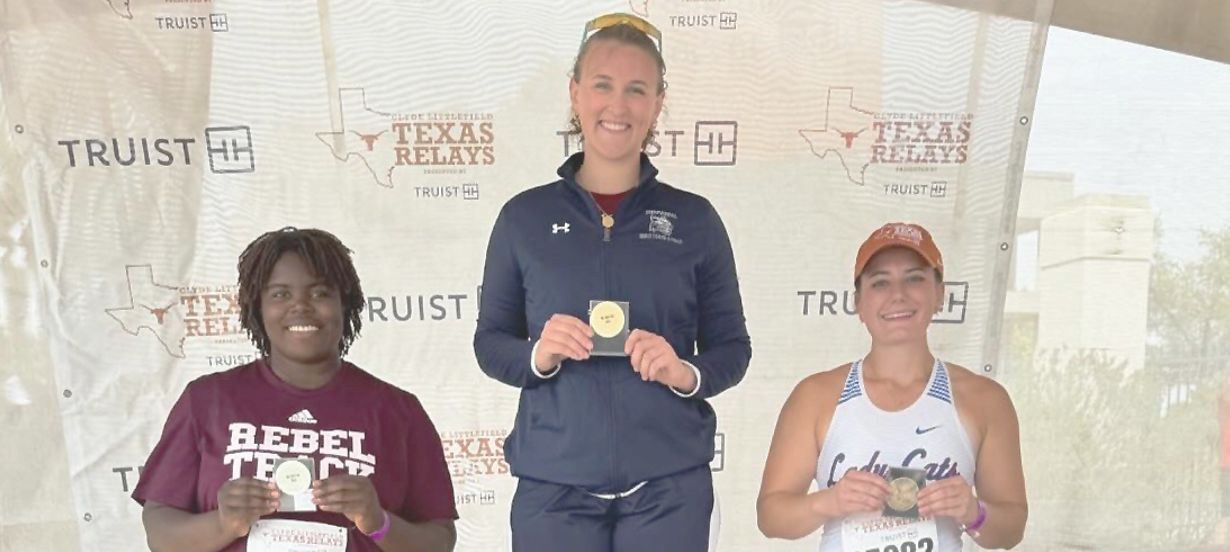 Fey on medal stand