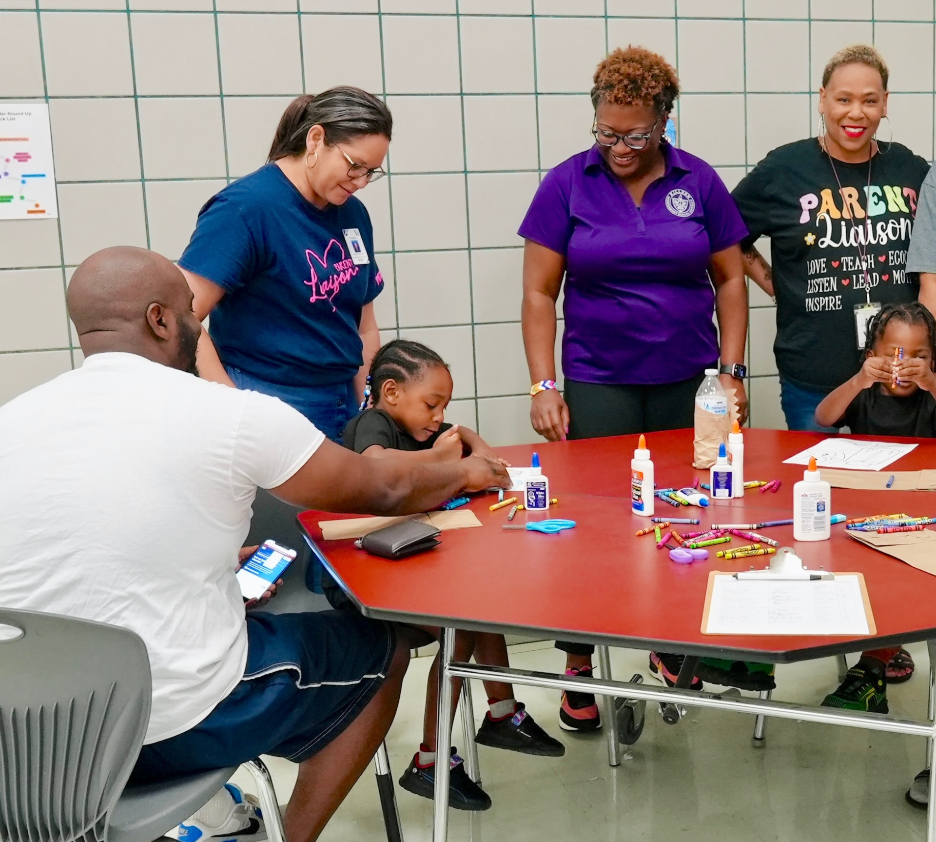 smilng kisd staff and families