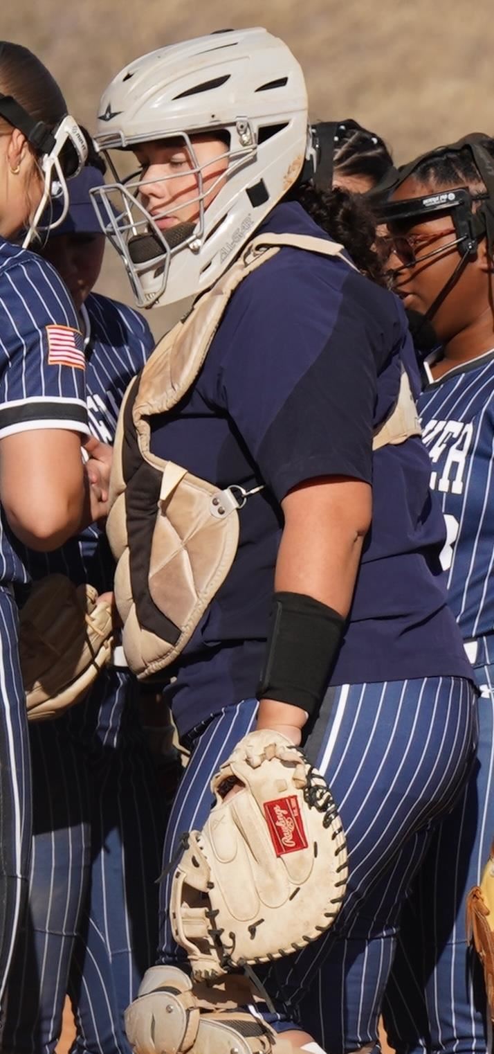 Catcher visits with the team