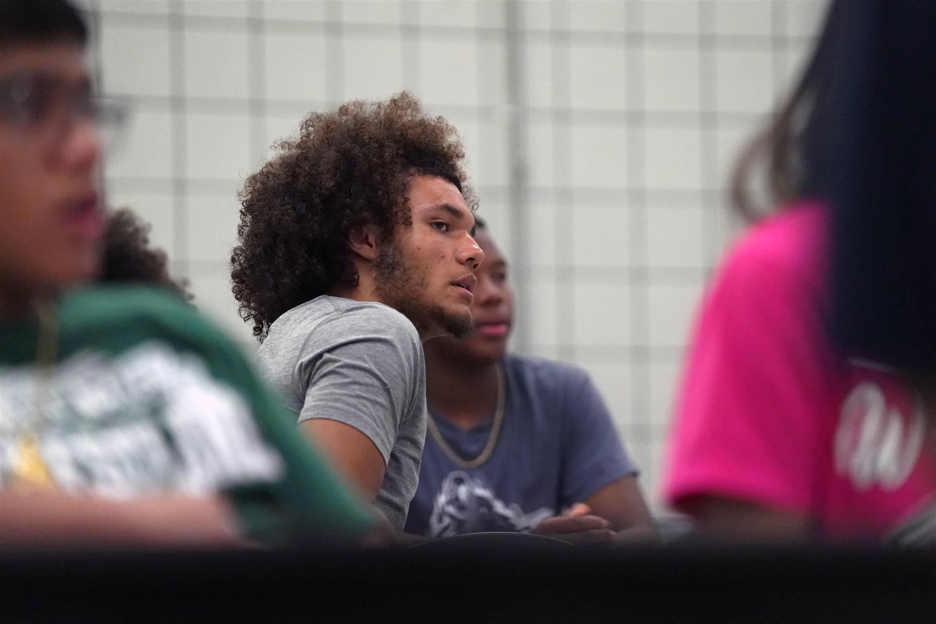 Student-athlete listens