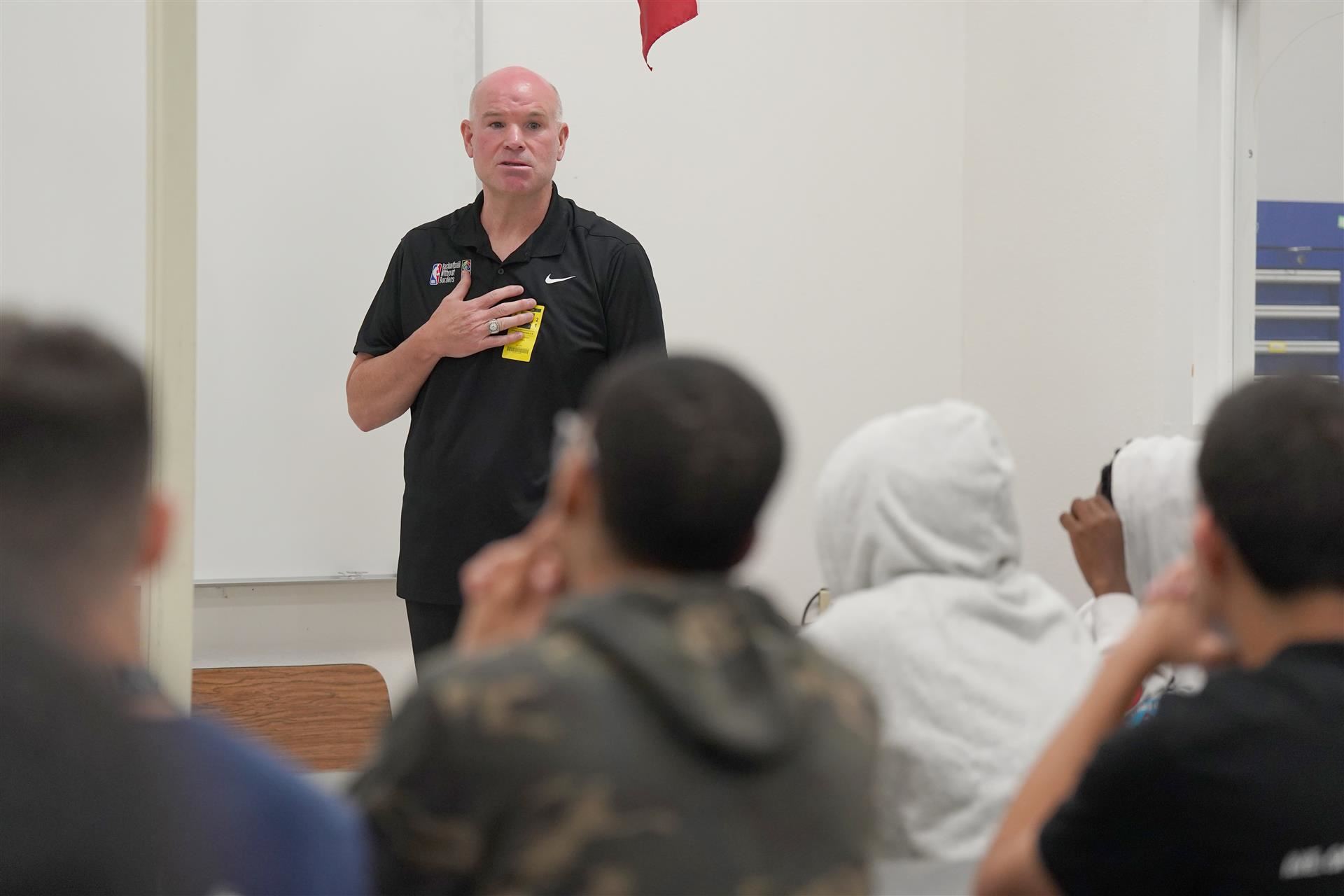 Former NBA official speaks to class