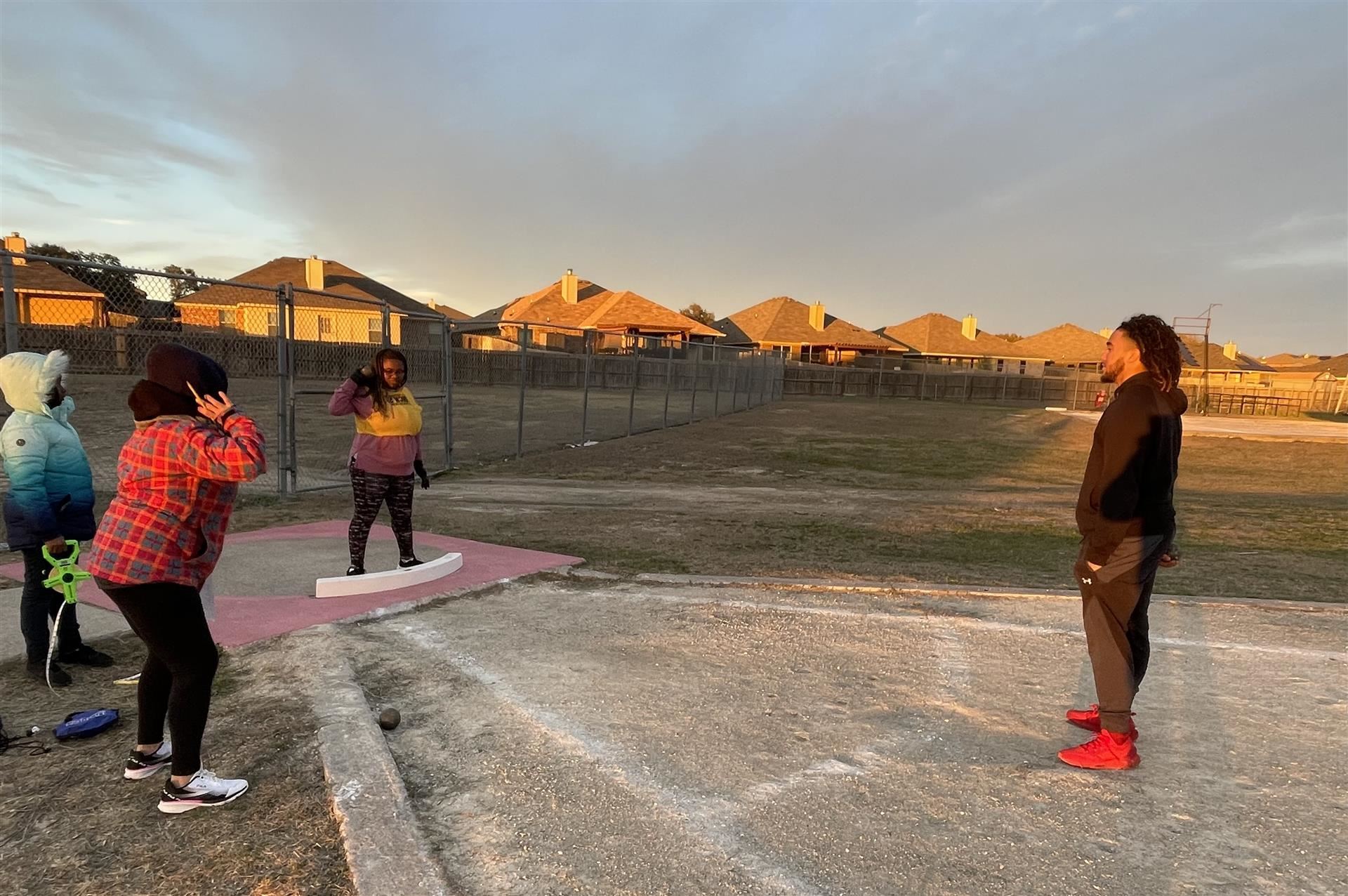 student athletes on a field