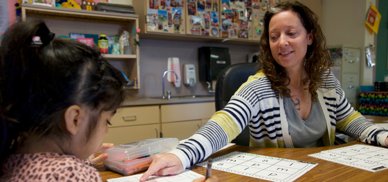  Smiling Killeen ISD teacher working with special education student