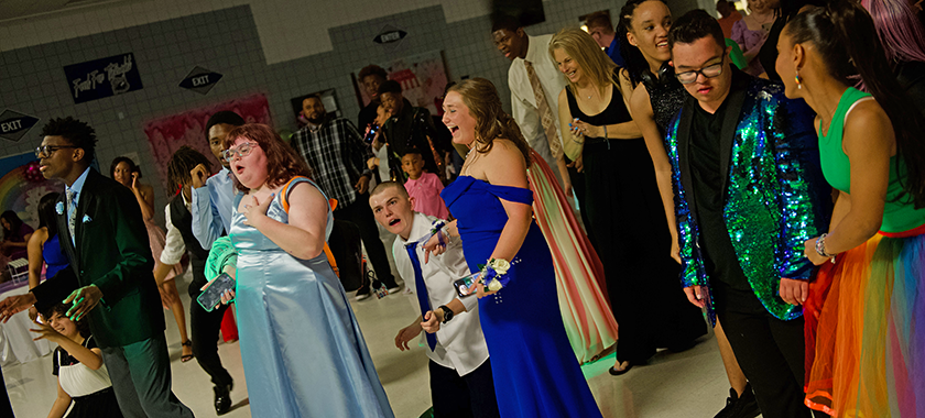 Students from multiple high schools dance at Angel Prom