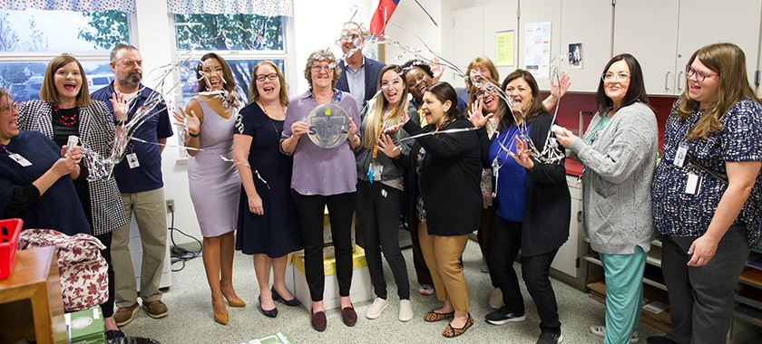  Killeen ISD leaders and Trimmier Elementary staff celebrate with beloved crossing guard