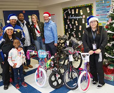 HHPD Blue Santa delivers bikes