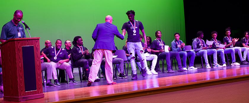  Ellison basketball players receive honors at community assembly