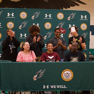 State wrestling champ signs with TWU