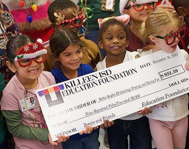 Kindergarten students grasp teacher grant