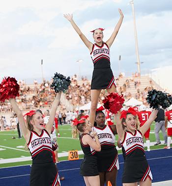 Cheerleaders hype up crowd