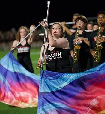 HH color guard performs at halftime