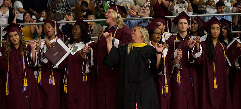 Killeen High School graduates sing the school song for the final time together 