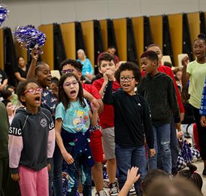 Students cheering during a rally