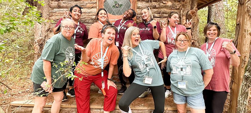 Haynes Elementary staff poses at Crocket ranch