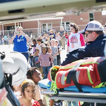 Elementary students tour helicopter