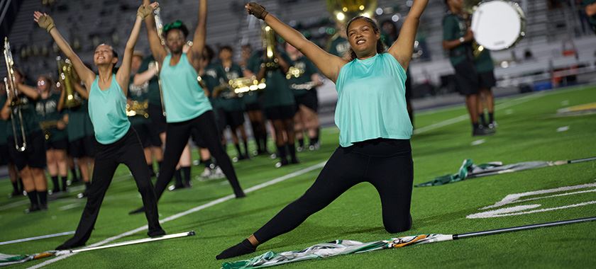  Ellison Excalibur color guard performs at football home opener
