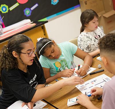 Elementary students learn coding
