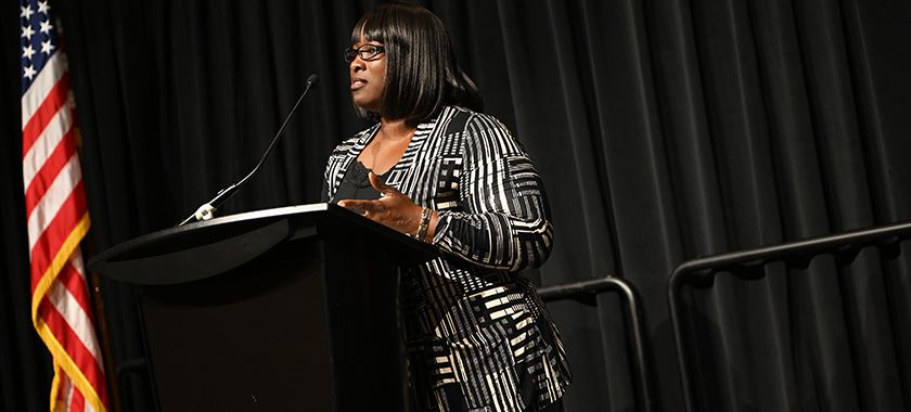 Elementary Teacher of the Year Evelyn Joseph addresses new teachers last August