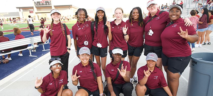  Killeen High School student trainers pose before a game