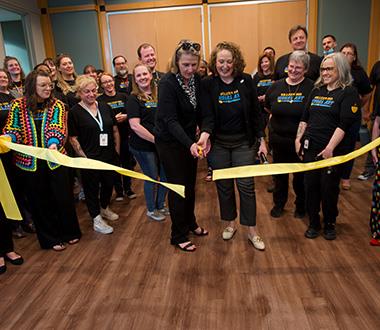Art instructors conduct ribbon cutting