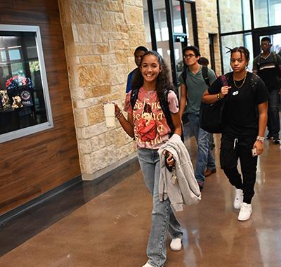 Students walking in to CHS